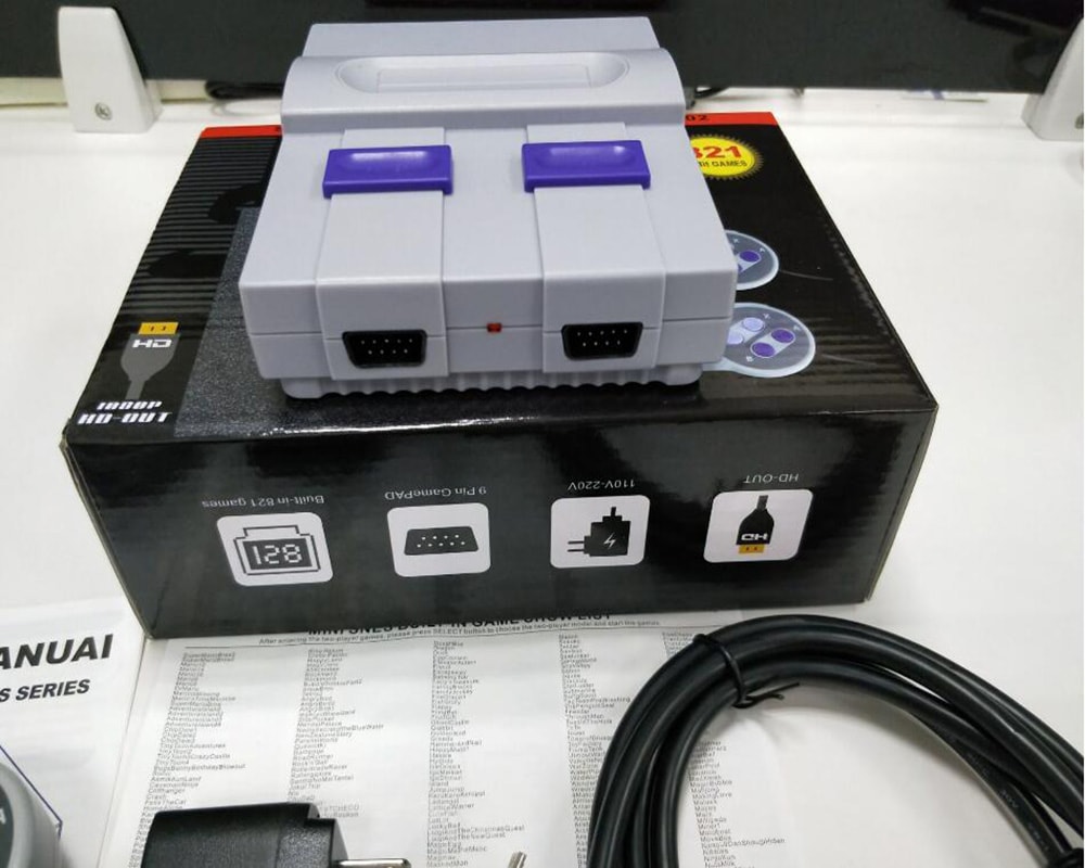 Super Mini 8 Bit Built in 821 Games HD TV Game Console- Platinum 13 x 10 x 4.5 CM Super Mini 8 Bit Built in 821 Games HD TV Game Console- Platinum 13 x 10 x 4.5 CM